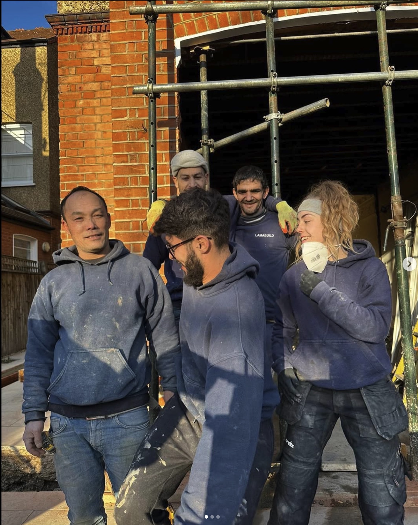 Lamabuild team installing glazing and glass panels on renovation project